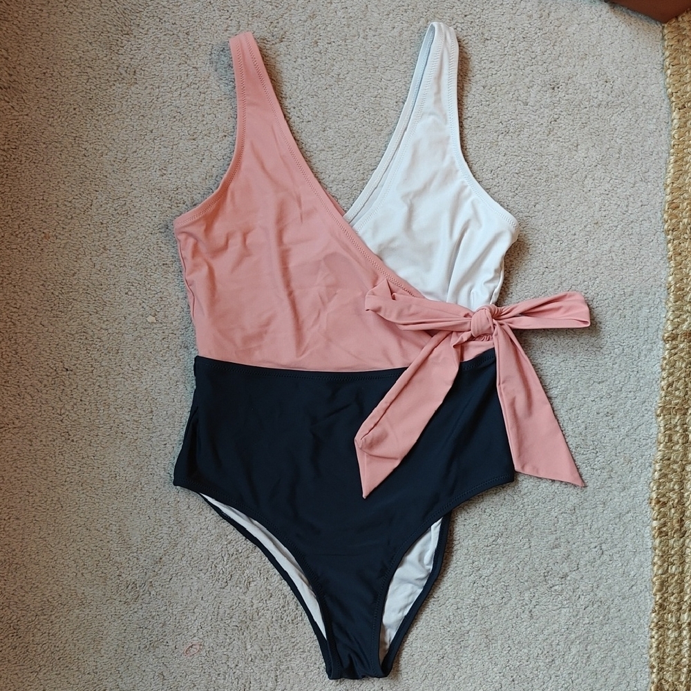 Chic Pink and White Swimsuit with Bow